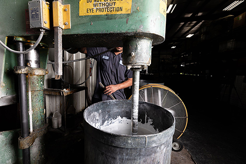 Industrial mixer blending coating material